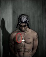 Tupac's Tattoos and Their Meanings: a Deep Dive into the Iconic Ink