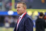 Why Does Kirk Herbstreit Travel with His Beloved Canine Companion?